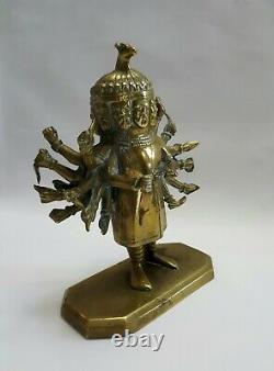 Large vintage Indian cast brass figure with nineteen arms and nine faces