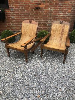 Pair Of Vintage Indian Teak Rattan Colonial Planters Plantation Lounge Chairs