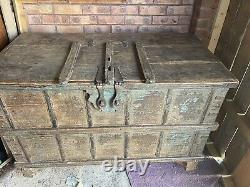 Vintage Indian dowry chest on original wooden wheels in good condition