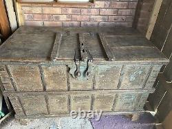 Vintage Indian dowry chest on original wooden wheels in good condition