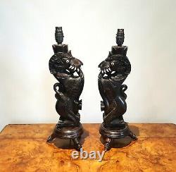 Vintage Southeast Asian Indonesian carved ironwood rewired dragon table lamps
