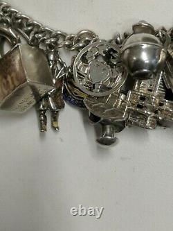 Vintage Sterling Silver 35Charms, bank of london check book Indian house Bracelet