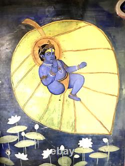 KRISHNA EN TERRE CUITE VINTAGE SUR UNE FEUILLE, PREMIÈRE FORME DE VIE SUR TERRE, TAMIL NADU DES ANNÉES 40