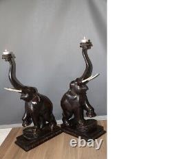 Paire de superbes lampadaires éléphants en bois sculpté de style vintage décoratif
