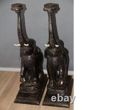 Paire de superbes lampadaires éléphants en bois sculpté de style vintage décoratif