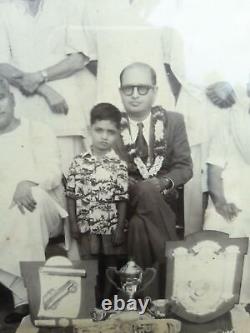 Photographie ancienne vintage de l'Inde du Sud montrant des personnes portant des dhotis de la victoire.