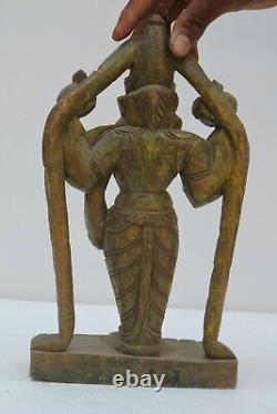 Statue debout en bois antique et faite à la main de la déesse Laxmi NH1421.